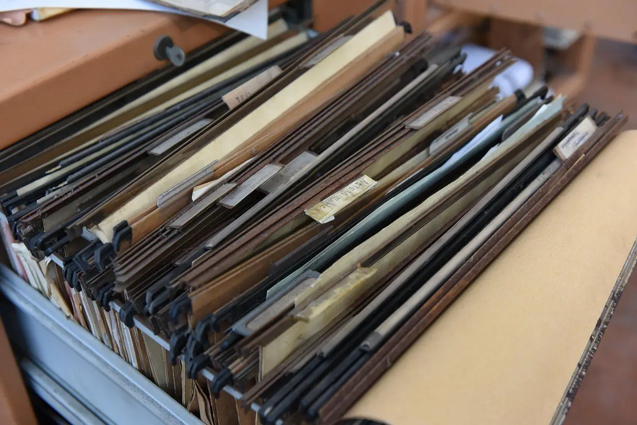 Rows of hanging file folders full of papers
