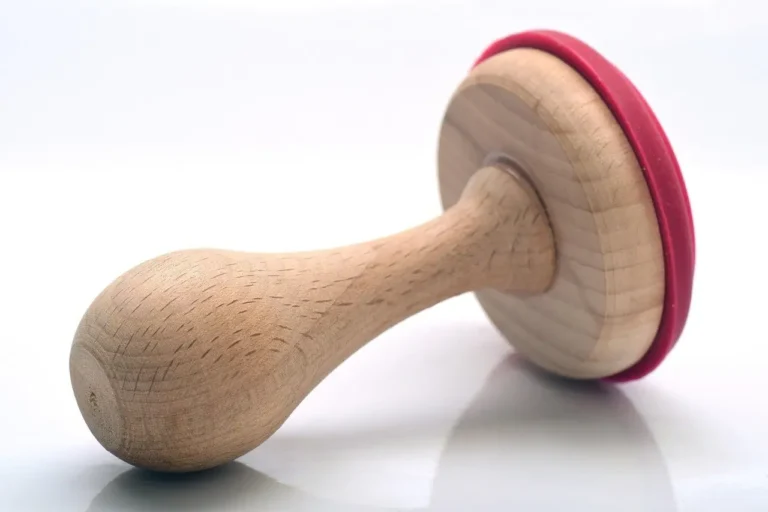 Wooden rubber stamp with a red base