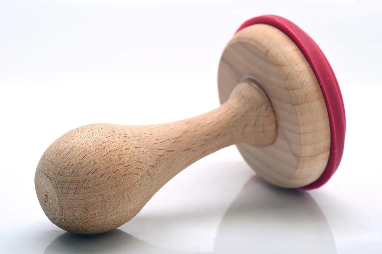 Wooden rubber stamp with a red base